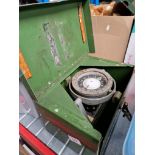 A military ship's compass ref. no. 41JJ/5 AFT No. 24B/54 in a green painted box.