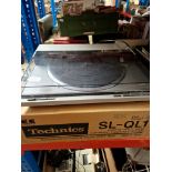 A Technics SL-QL1 turntable - for spares and repairs - sold as seen