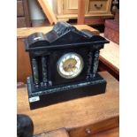 A black slate and marble mantle clock with pendulum and key, by H L Brown & Sons, Sheffield and