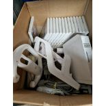 A box of Wii games, console, controllers etc