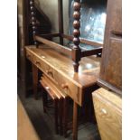 A mid 20th century walnut dressing table together with a teak and tile top nest of tables.