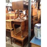 A mahogany sofa table, a mahogany drop leaf table and an aged oak coffee table.