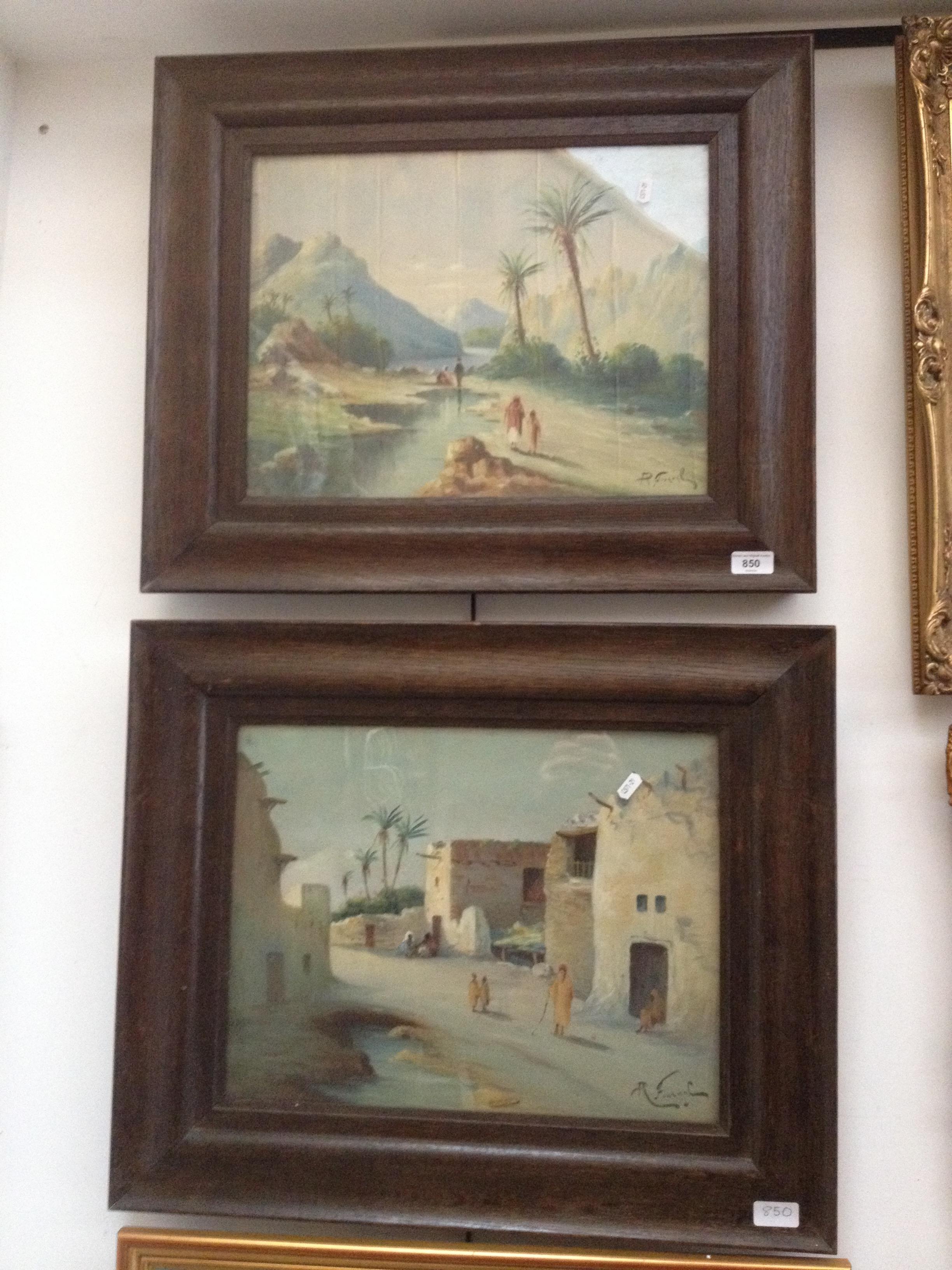 A pair of early 20th century school, North African scenes, oil on canvas, 45cm x 34.5cm, each signed