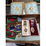 A case of Masonic regalia to include two hallmarked silver medals / pins, one awarded to Bro. Thomas