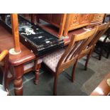 A Quasar Design Jarrah (wood) dining table and six chairs including two carvers.