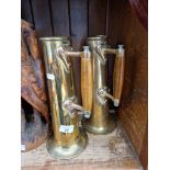 A pair of brass and copper ship's oil lamps filler jugs.