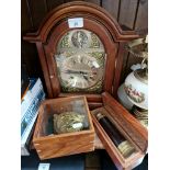 A 31 day mantle clock with key, a reproduction brass compass in wood/glass case, and a