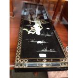 A set of four Chinese black lacquer and mother of pearl panels depicting warrior women.