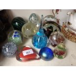 12 glass paperweights including Alum Bay and Kerry etc