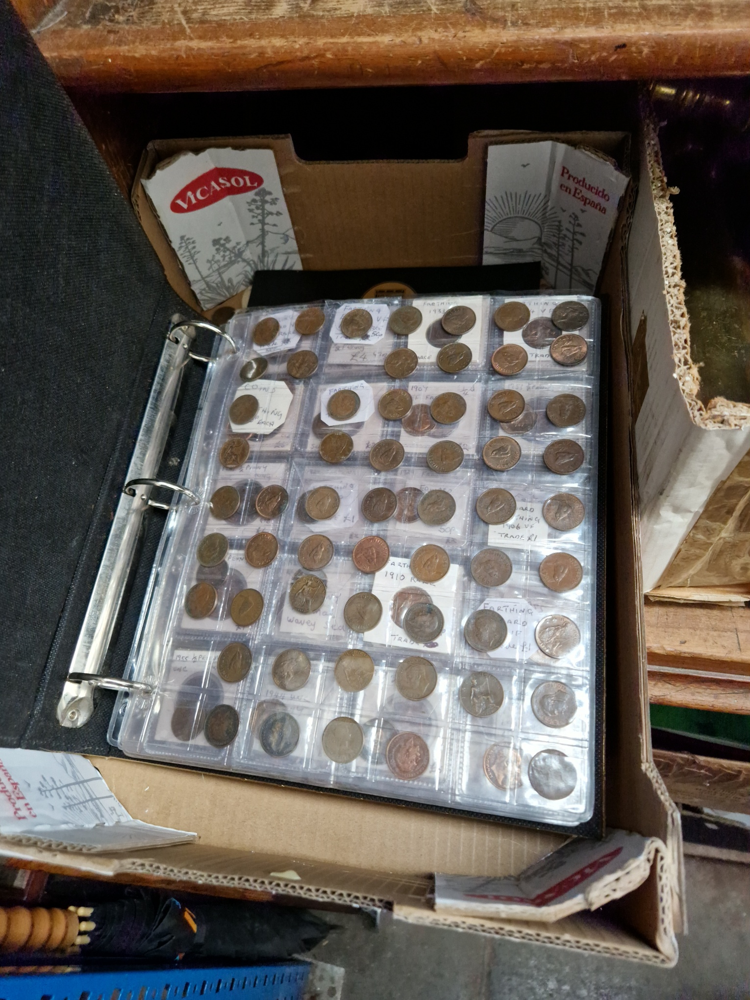 A box of uk coins and world banknotes etc.