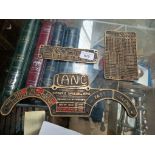 Three vintage brass plaques to include a Lanc driving pulley plaque, a John Lang & Sons Ltd brass