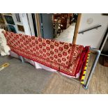 A Turkish carpet, red ground 240cm x 160cm.