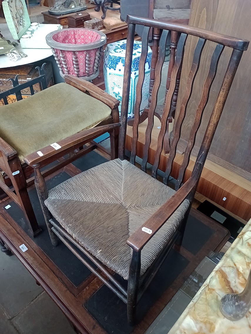 An Arts & Crafts ebonised and rush seat chair together with an Edwardian adjustable piano stool. - Image 2 of 3