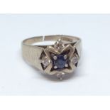 A diamond and sapphire cluster ring marked '18ct GOLD', band cut, gross wt. 4.4g, approx. size J/K.