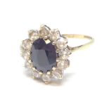 A hallmarked 9ct gold sapphire and CZ cluster ring, gross wt. 2.3g, size Q.