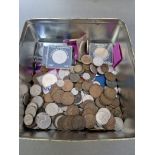 A tin of assorted GB and world coins to include commemorative crowns, Victorian & Edwarian etc.