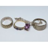 Four pieces of jewellery comprising a hallmarked 9ct gold wedding band wt. 4.7g, a hallmarked 9ct