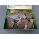 A tin of assorted New Zealand coins including some silver.