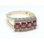 A garnet and diamond cluster ring, hallmarked 9ct gold, gross. wt. 4.1g, size S.