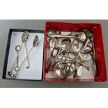 A box of assorted hallmarked silver spoons & sugar tongs together with 3 white metal items (