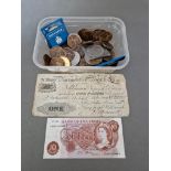 A tub of assorted GB coins and banknotes to include Victorian pennies and commemorative crowns etc.