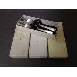 Four boxed Georg Jensen Sterling silver Christmas spoon and fork sets, comprising years 1968, 69, 70