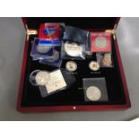 A case of assorted commemorative coins.
