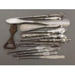 A collection of six silver handled button hooks and two silver handle shoe horns, together with