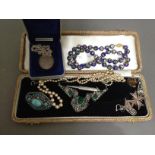 A mixed lot of vintage jewellery including silver etc.