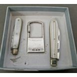 Three silver items to include two hallmarked silver and mother of pearl penknives and a silver