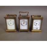 Three brass carriage clocks.