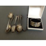 Hallmarked silver comprising spoons, sugar tongs and a serviette ring.