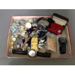 A box of assorted watches and jewellery, also including a nugget of fool's gold.