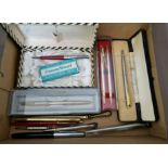 A box of assorted fountain pens, ballpoints & pencils to include Parker, Scripto and Conway