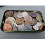 A tin of assorted Irish, Channel Islands and Manx coins.