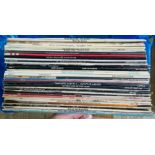 A bag of assorted LPs.