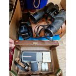 Assorted camera equipment comprising a Minolta X700 35mm camera, a pair of Canadian binoculars, a