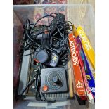 An Atari games console and games and accessories.