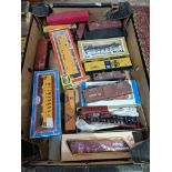 A box containing American HO scale model railway freight wagons.