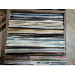 A wooden box of approximately 62 vinyl LP records including Eddie Cochran, Stevie Wonder, Elvis,