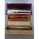 A silver plated flute and two recorders: Dolmetsch and JJ van de Geest.