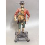 A reproduction cast metal figural clock, height 40cm.