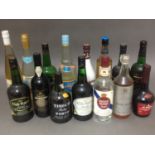 A box of assorted alcoholic drinks to include cherry brandy, vodka, rum, sherry and liquors etc.