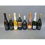 7 bottles of sparkling wine including Prosecco and a bottle of mulled wine