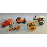 Five vintage mechanical tin toys