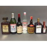 Seven bottles of assorted spirits and liquors.