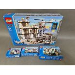 Four boxed Lego City Sets; 7235- Police Motorcycle Set, 7236- Police Car Set, 7237- Large Full