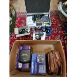 A box of cameras and accessories to include a Pentax Zoom90-WR, a Olympus IS-10, a Olympus Stylus