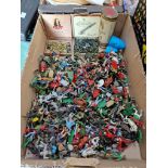 A box with large collection of soldiers, mainly Britains Ltd.
