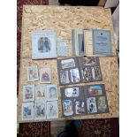 Assorted ephemera including two post card albums, mainly Scotland, WWII wartime photographic prints,